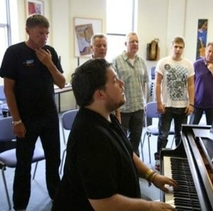 Tom Knight teaching piano.